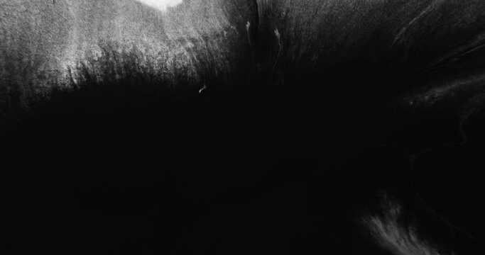 Ink water flow. Opener transition overlay. Paint drop motion. Black dye stain wipe wave on white grain texture abstract copy space background.