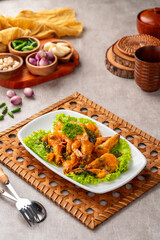 udang saus telur asin or Salted egg fried shrimp with curry leaves
