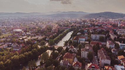 Aerial view of the river Ljubljanica, Ljubljana Slovenia. Summer landscape. Travel in Europe drone photo.