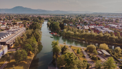 Aerial view of the river Ljubljanica, Ljubljana Slovenia. Summer landscape. Travel in Europe drone photo.