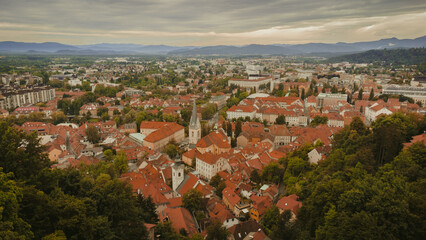 Fototapeta na wymiar Ljubljana, Slovenia city center view from above. Green capital of Europe, Old Castle. An aerial view drone photo.
