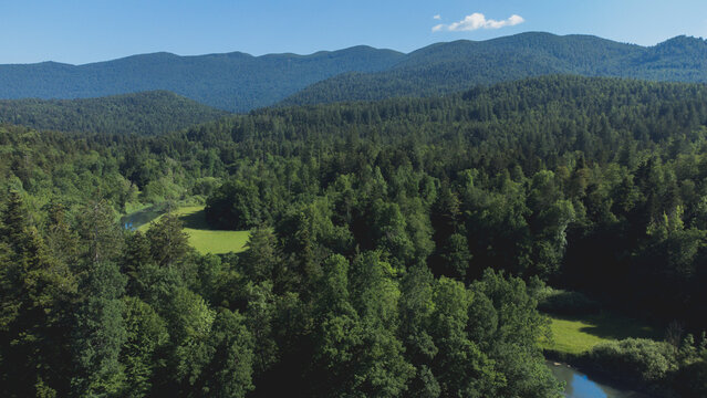 Slovenia Countryside Picturesque Green Hills, River View From Above. Bright Light, Sunny Day