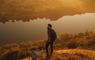 Man admiring river in morning