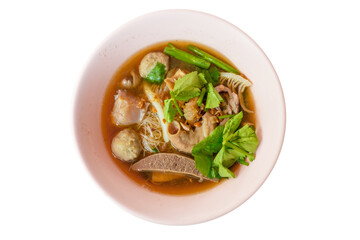 Top view of Chinese clear soup and Beef noodle entrails and vegetables , focus selective