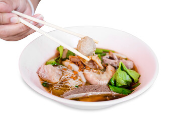 Top view of Chinese clear soup and Beef noodle entrails and vegetables , focus selective