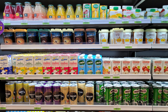 PENANG, MALAYSIA - 9 AUG 2022: Huge open fridge with various choice foods and beverages in CU Convenience Store. CU is a South Korean convenience store chain that is operated and owned by BGF Retail.