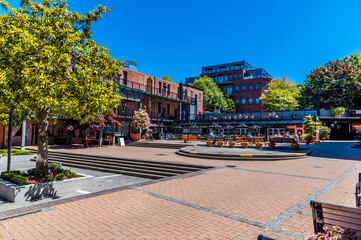 A view across a quiet market square in Victoria British Colombia, Canada in summertime