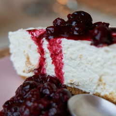 Delicious homemade cheesecake served as dessert in an elegant Italian restaurant. Food concept