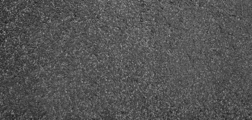 Fototapeta premium Asphalt background texture with some fine grain 