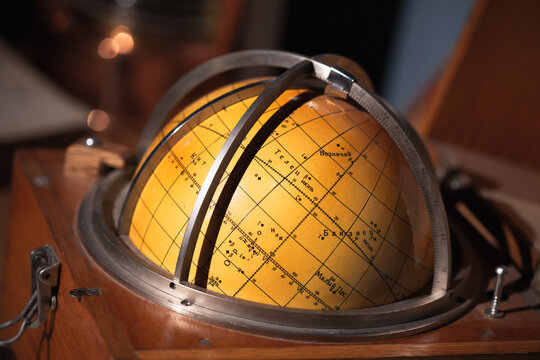 Star sky globe in wooden box, marine navigation tool