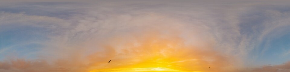 Bright sunset sky panorama with Cirrus clouds. Hdr seamless spherical equirectangular 360 panorama. Sky dome or zenith for 3D visualization, game and sky replacement for aerial drone 360 panoramas.