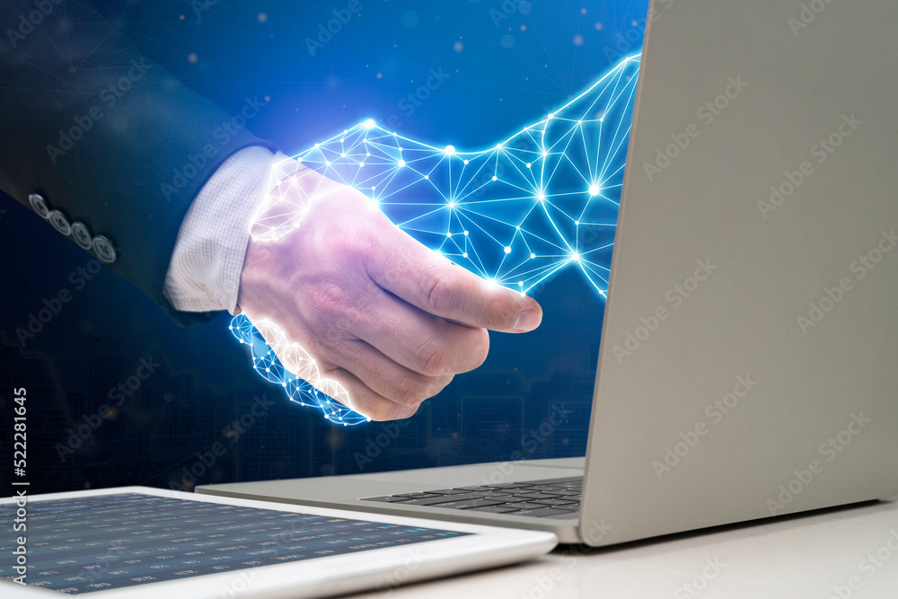 Poster businessman shaking hands with digital partner extending from laptop computer on futuristic backgrou
