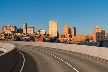 Empty urban asphalt road exterior with city buildings background. New modern highway concrete construction. Concept way to success. Transportation logistic industry fast delivery. San Francisco. USA.