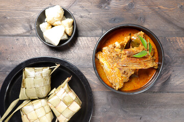 Kari or Gulai Iga Kambing or is Indonesia Traditional mutton ribs curry soup. is a type of food containing rich and spicy.