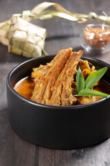 Kari or Gulai Iga Kambing or is Indonesia Traditional mutton ribs curry soup. is a type of food containing rich and spicy.