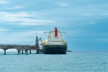 LNG tanker during loading at an liquefied natural gas offshore terminal