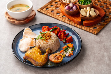 Steamed Rice with Fried Chicken or Hainanese Chicken Rice.