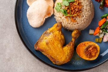 Steamed Rice with Fried Chicken or Hainanese Chicken Rice.