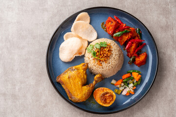 Steamed Rice with Fried Chicken or Hainanese Chicken Rice.