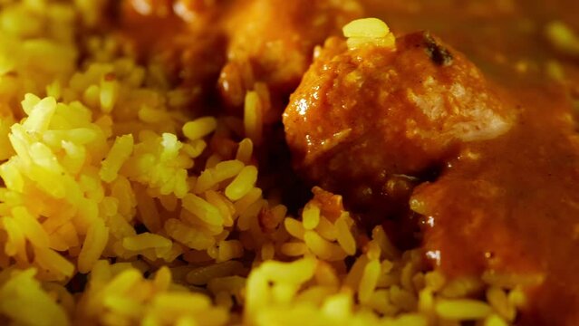 Chicken Korma curry with Pilau rice and naan bread