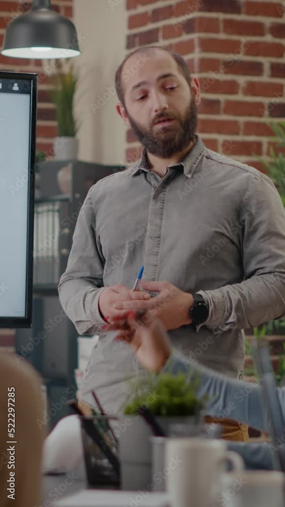 Poster vertical video: close up of worker presenting business strategy on display with data analysis, worki