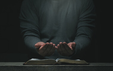 Men pray from god blessing to have a better life. Christian Crisis Prayer to God. Men's hands...