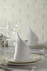 Stylish elegant table setting for festive dinner in restaurant