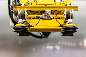 Yellow robot head with suction cups