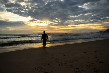 Naklejka premium Photo of a man alone on the beach in the afternoon, Aceh, Indonesia.