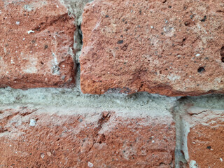 A fragment of an old brick wall in the city center of Lodz.
