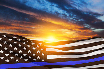 American flag with police support symbol Thin blue line on sunset sky. American police in society...