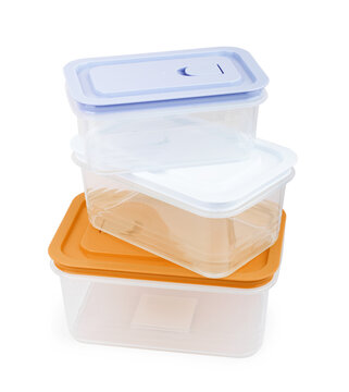 Plastic containers for food on wooden table on blue background