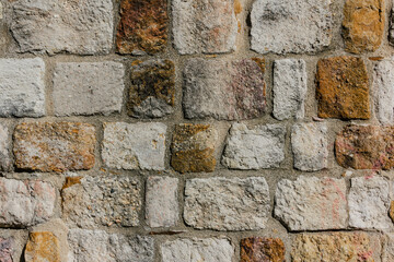 Stone wall texture. Selective focus. Copy space.