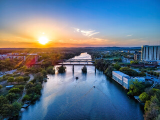 Aerial view of Colorado River during sunset in an urban area at Austin, Texas