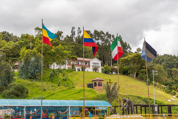 banderas de colombia, cundinamarca y zipaquira, junto a la de catedral de sal - obrazy, fototapety, plakaty