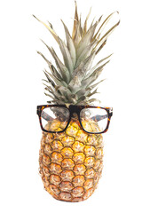Pineapple wearing sunglasses. Summertime vacation holiday eating healthy concept.