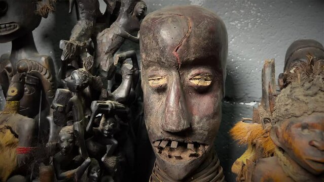 African statues, African art filmed with dolly camera zoom out and zoom in 