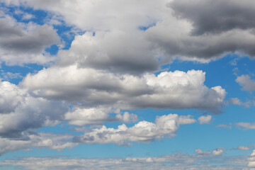 Clouds background. White clouds in a blue sky