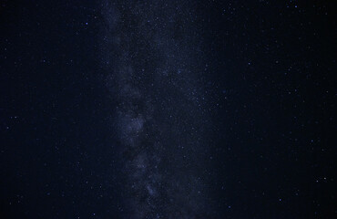 Obraz na płótnie Canvas Menorca, Spain: Panoramic long exposure Night astrophotography. Milky Way over Son Bou beach, Menorca, Balearic Islands, Spain