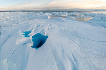 Climate change and global warming. Icebergs from a melting glacier in Ilulissat Glacier, Greenland....