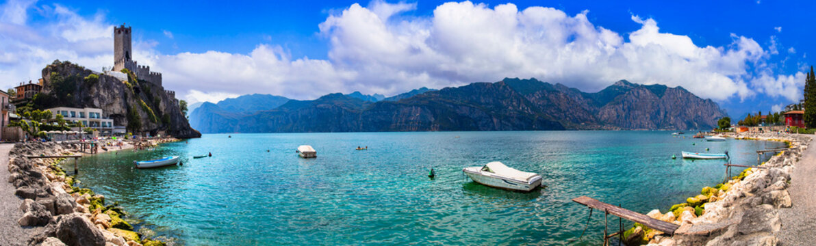 Amazing italian lakes scenery - beautiful Lago di Garda. panoramic view of Malcesine castle and beach