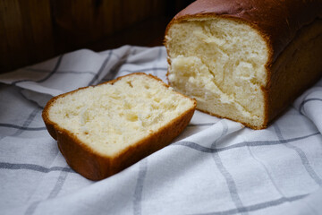Freshly baked white Japanese milk bread with soft fluffy bun. Homemade pastries for sandwiches