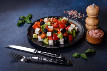 Greek salad with fresh vegetables, feta cheese and black olives