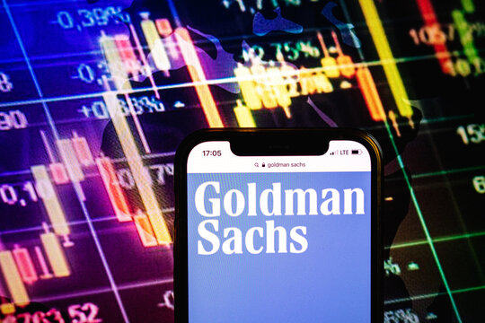 KONSKIE, POLAND - August 09, 2022: Smartphone displaying logo of Goldman Sachs company on stock exchange chart background