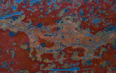 Abstract background from an old wall damaged by the weather.
