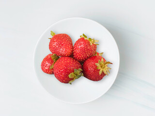 strawberries on a plate
