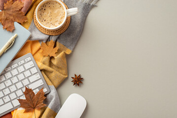 Autumn business concept. Top view photo of keyboard computer mouse notebook pen cup of cocoa on rattan serving mat anise yellow maple leaves and scarf on isolated grey background with copyspace
