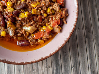 Chili con carne, a traditional Mexican dish with beef and beans.