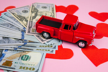 red typewriter and dollar money