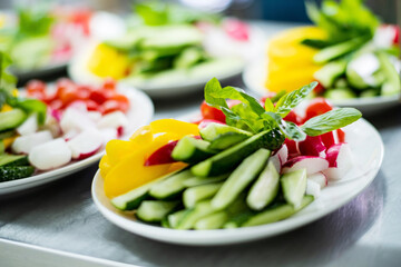 Platter of assorted fresh vegetables with dip